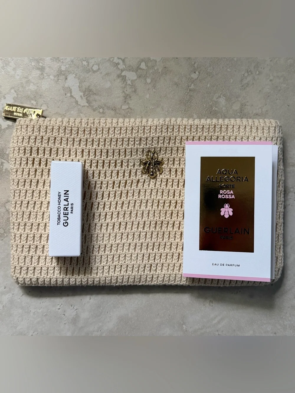 GUERLAIN Beige Woven Clutch with Gold Accent Abeille Royale 🐝